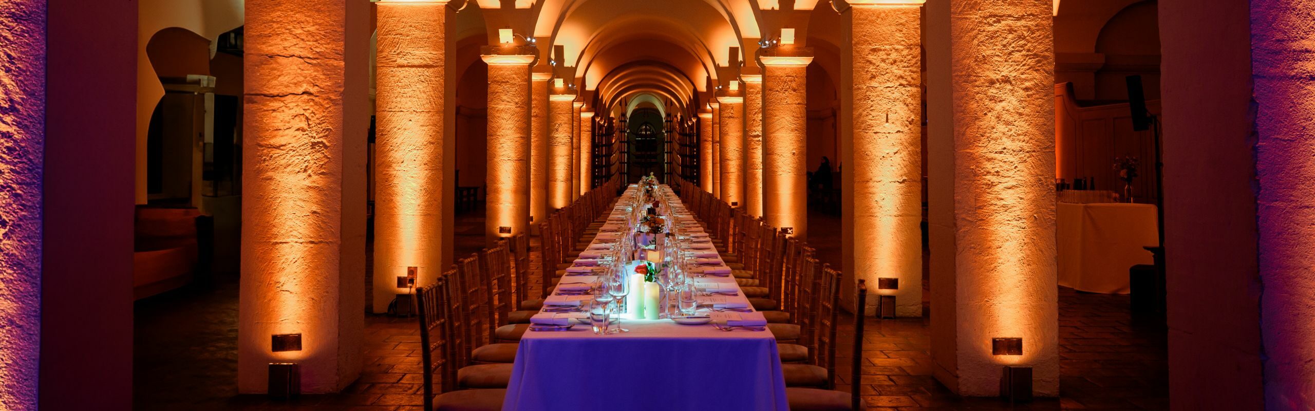 Long dining table set for an event in St Paul's Cathedral